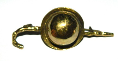 Jolie broche métal doré - en,